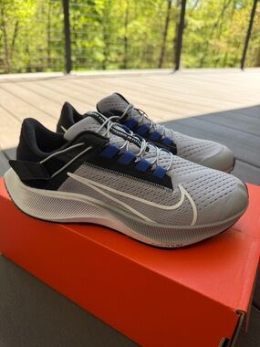 Nike Men’s Gray Athletic Shoes with Blue and Black Accents